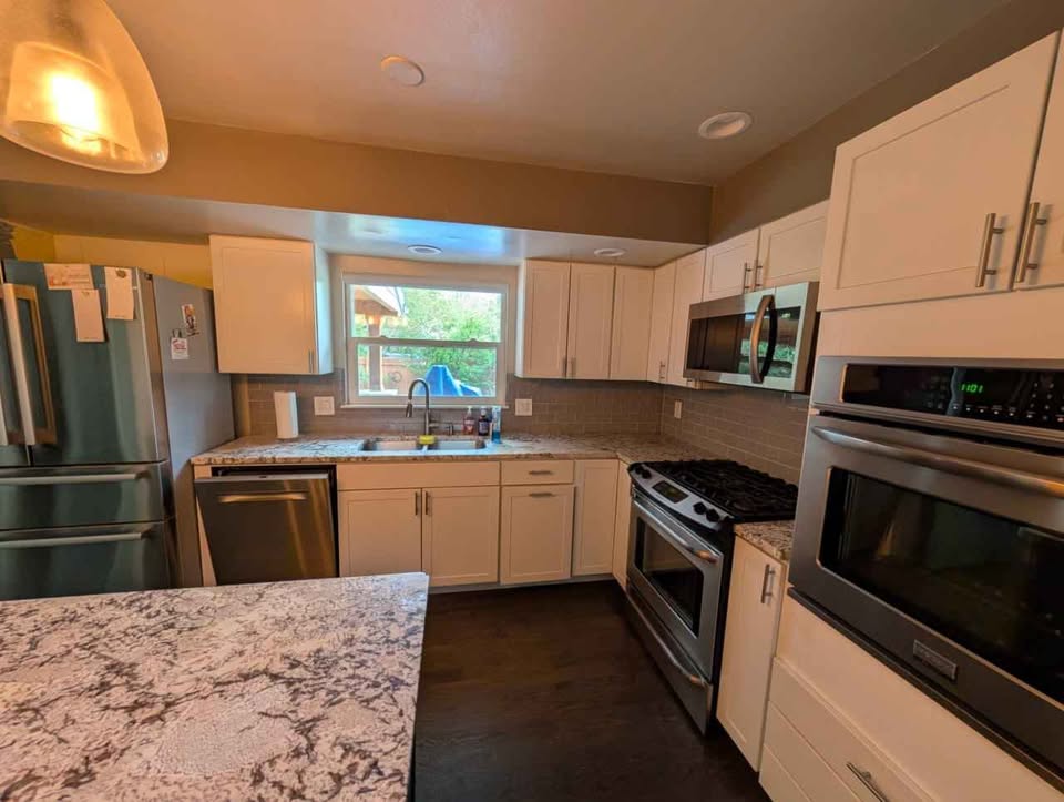 White Kitchen with Granite Countertops
