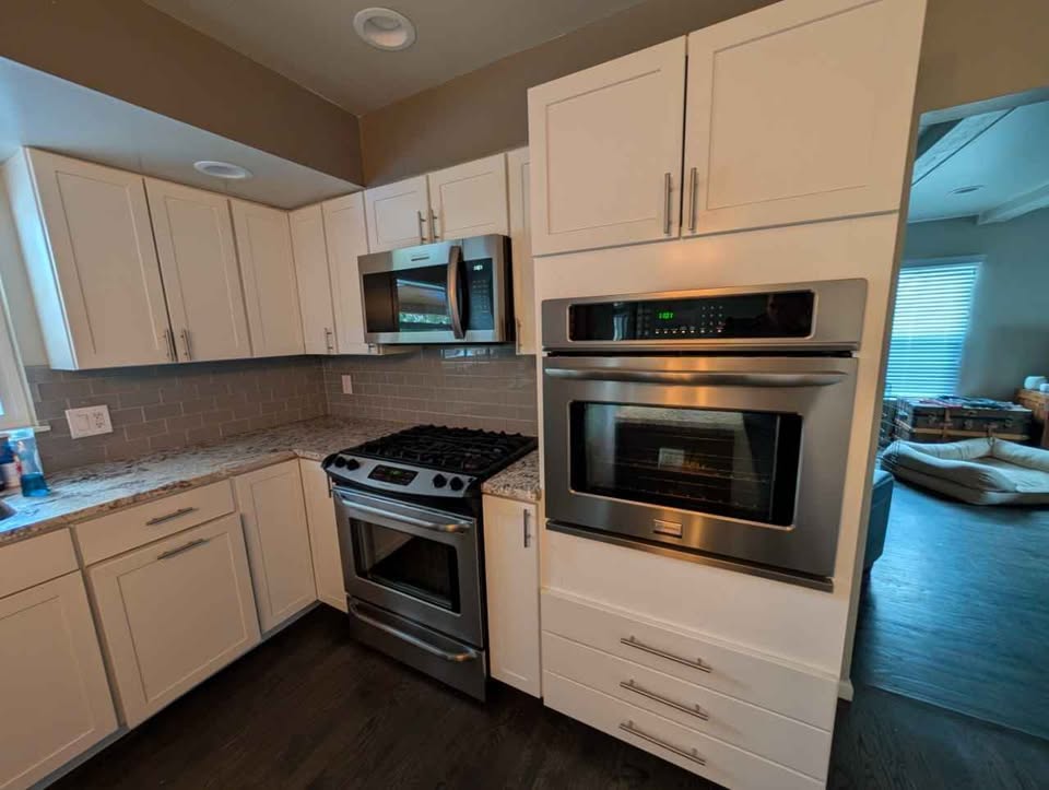 White Kitchen with Granite Countertops