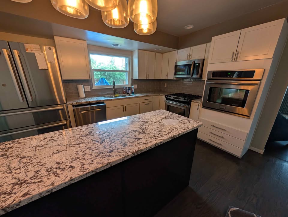 White Kitchen with Granite Countertops