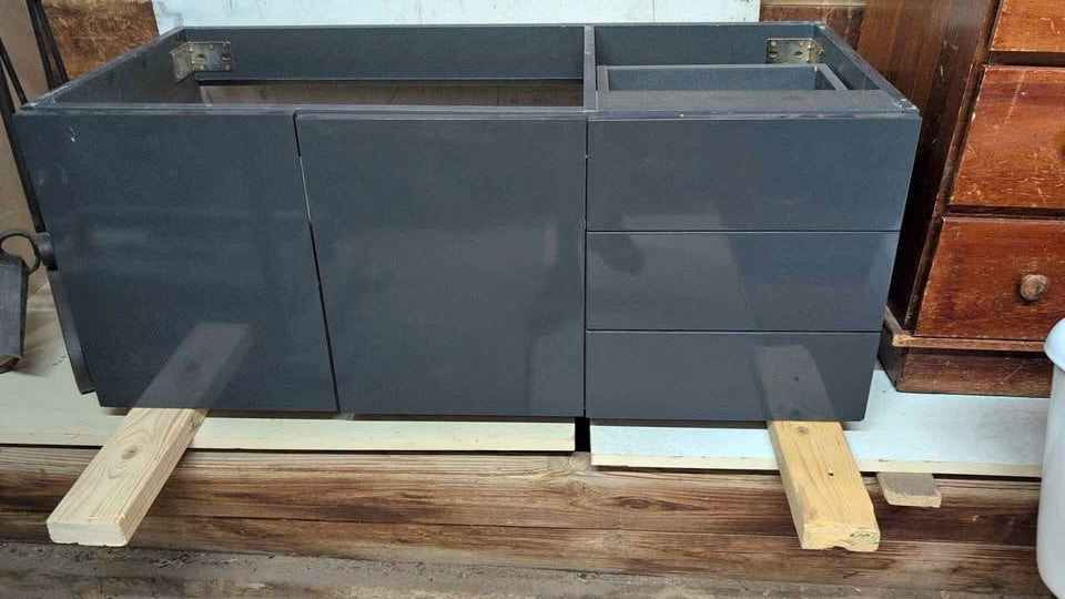 42" floating grey vanity. 3 drawers 2 doors. Like new.